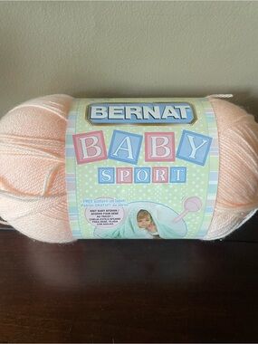 One full skein Bernat Baby Sport yarn Peach Blossom 10.5 oz. 1077 yds NEW